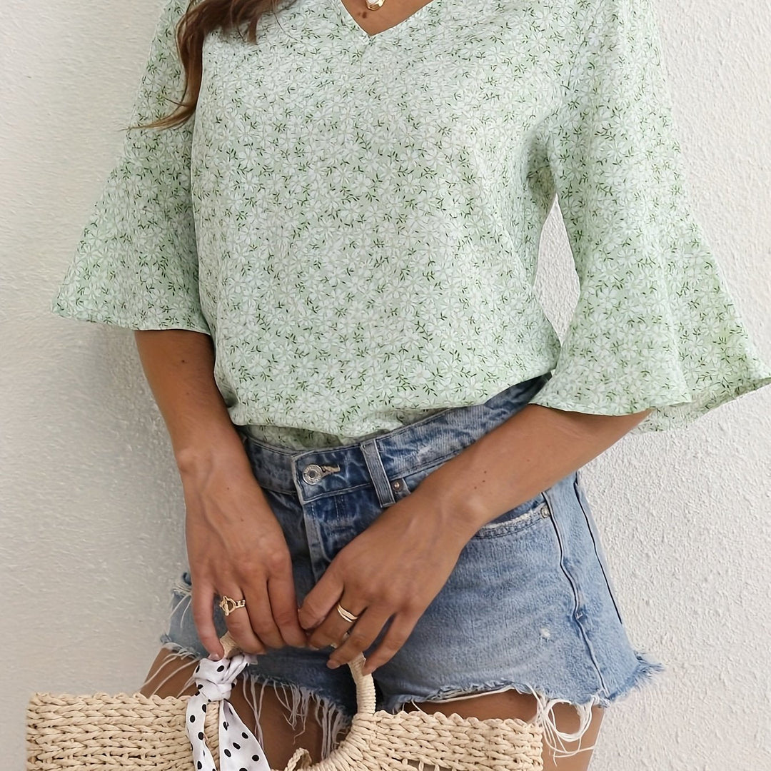 Sheila | Blusa floral con mangas volantadas