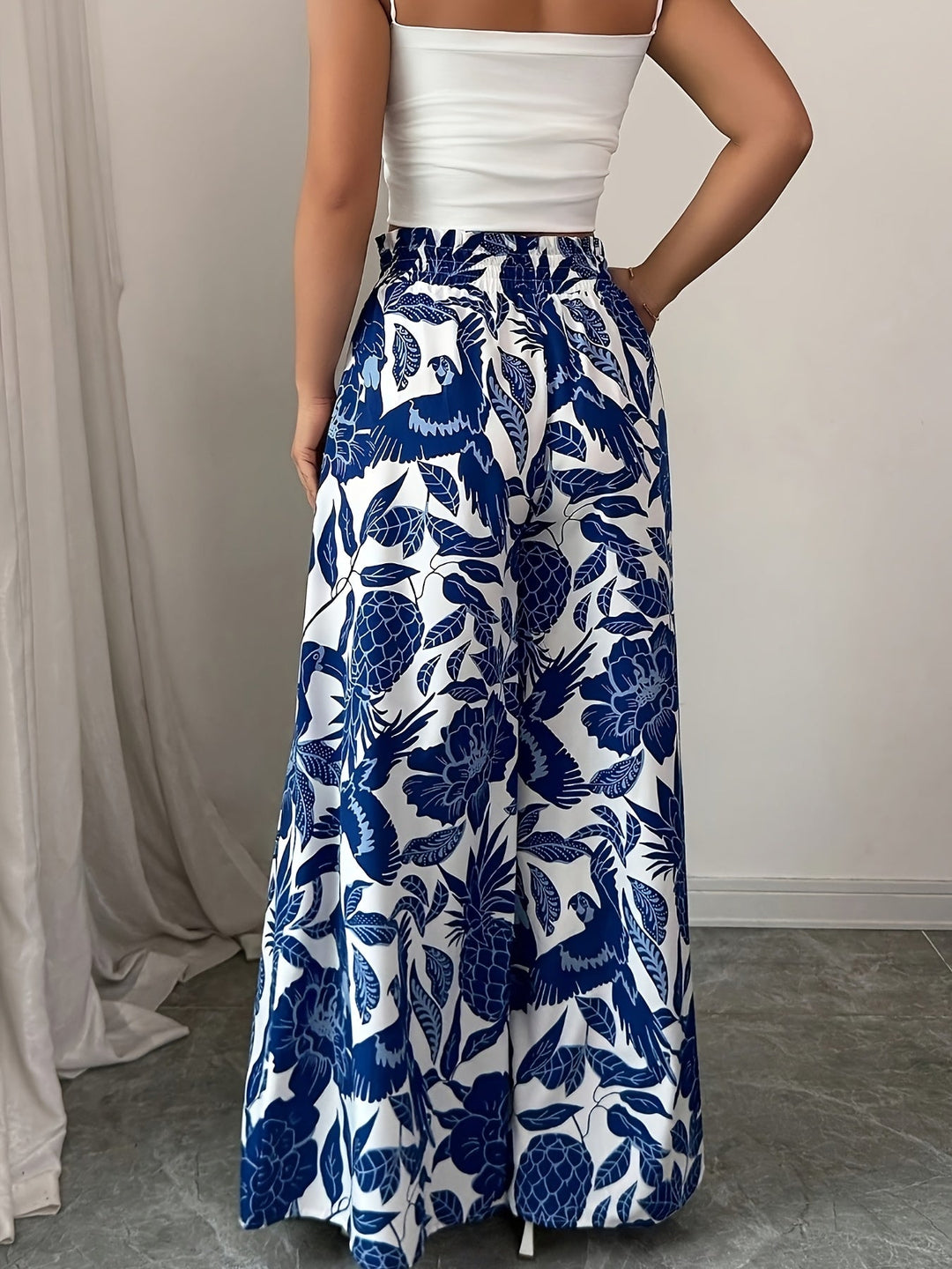 Rossana | Pantalones anchos con print de hojas