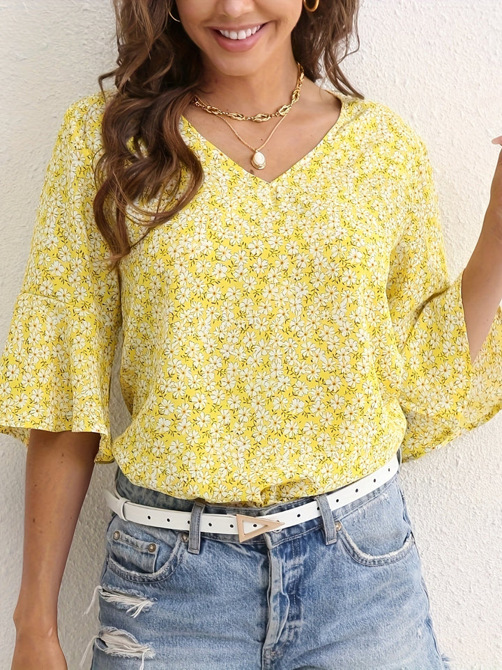 Sheila | Blusa floral con mangas volantadas