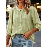 Clara | Blusa con cuello bebé y bordado frontal