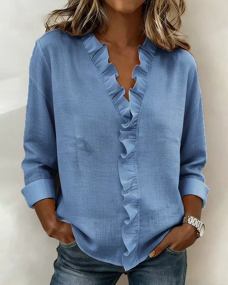 Ana Belén | Blusa elegante escote en V con vuelos