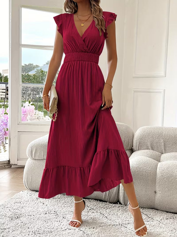 Yamila | Vestido largo sin mangas con escote V y volantes