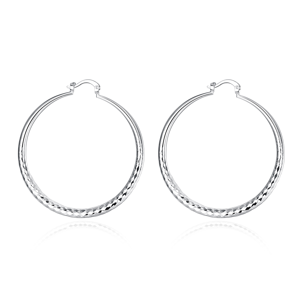 Natacha | Aros largos plateados estilo retro