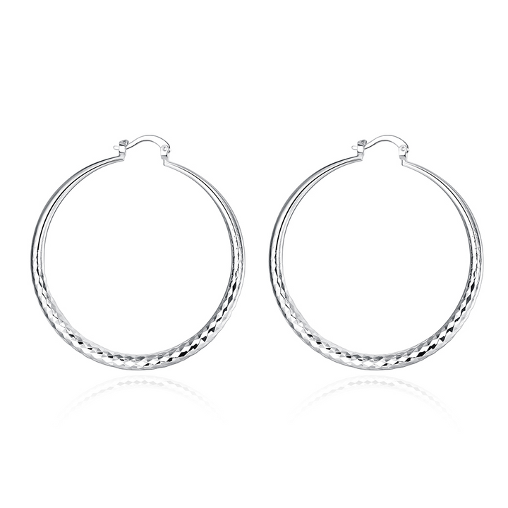 Natacha | Aros largos plateados estilo retro