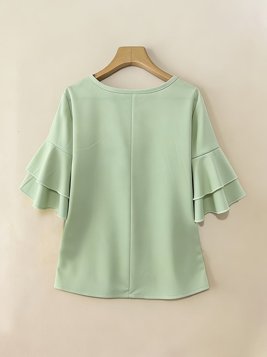 Naomi | Blusa plisada de mangas acampanadas