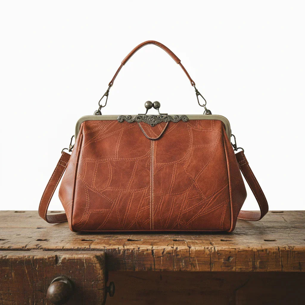 Delfina | Cartera vintage con cierre de beso