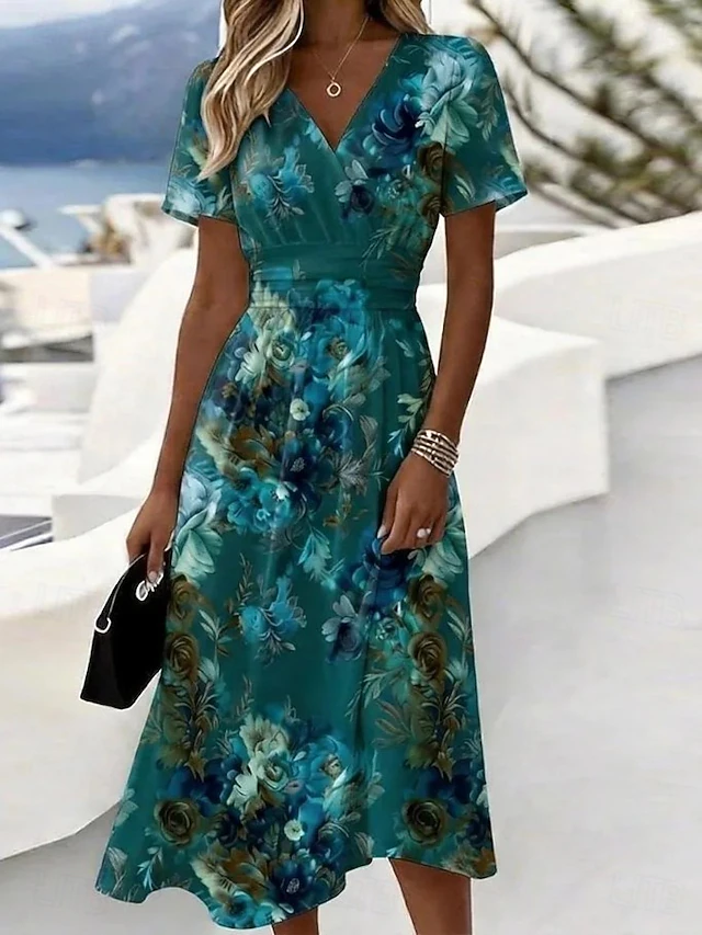 Noelia | Vestido midi vaporoso con estampado de hojas
