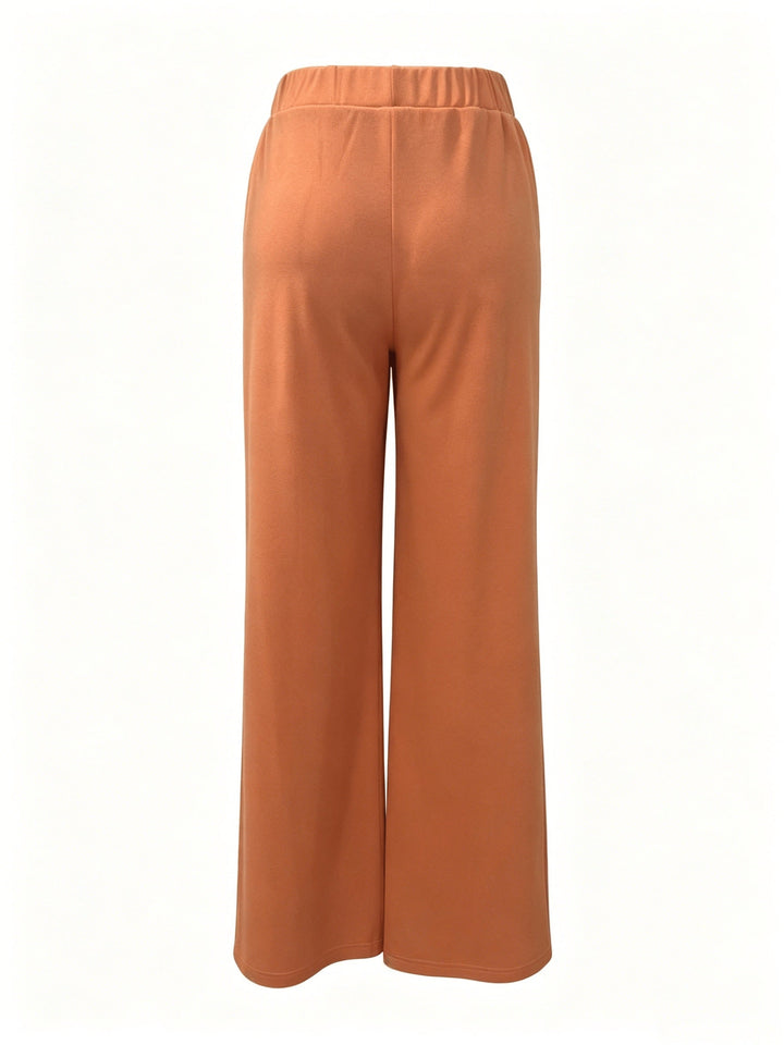Saray | Pantalones de tiro alto y pierna ancha