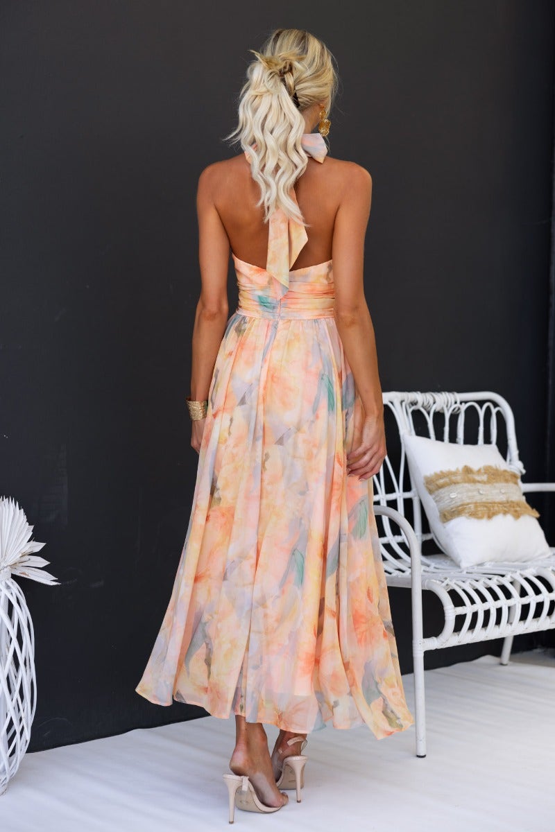 Amparo | Vestido largo sin mangas con cuello alto anudado