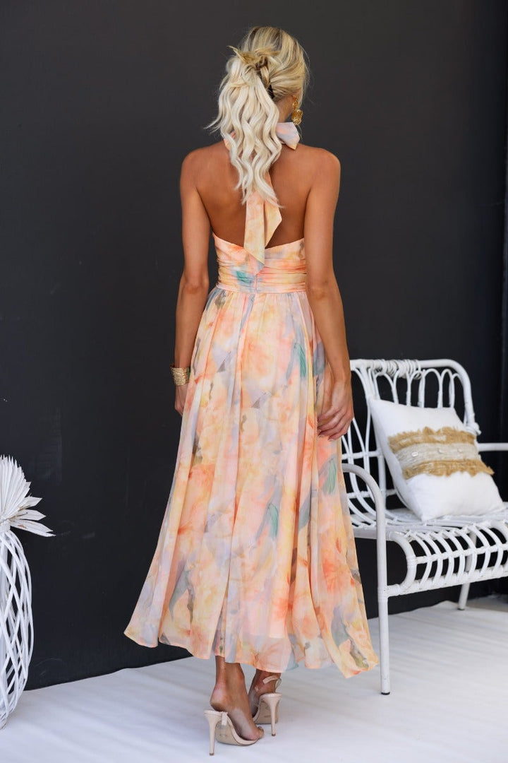 Amparo | Vestido largo sin mangas con cuello alto anudado