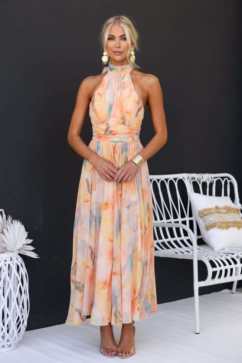 Amparo | Vestido largo sin mangas con cuello alto anudado