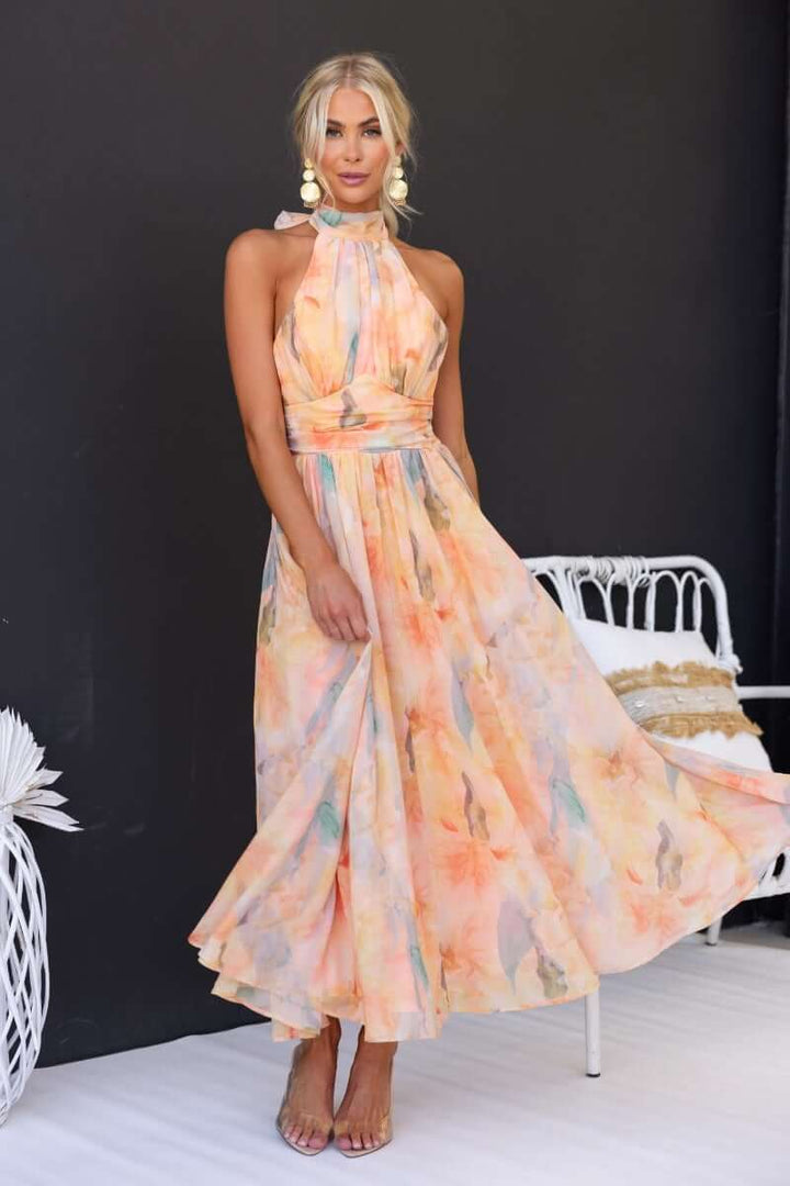 Amparo | Vestido largo sin mangas con cuello alto anudado