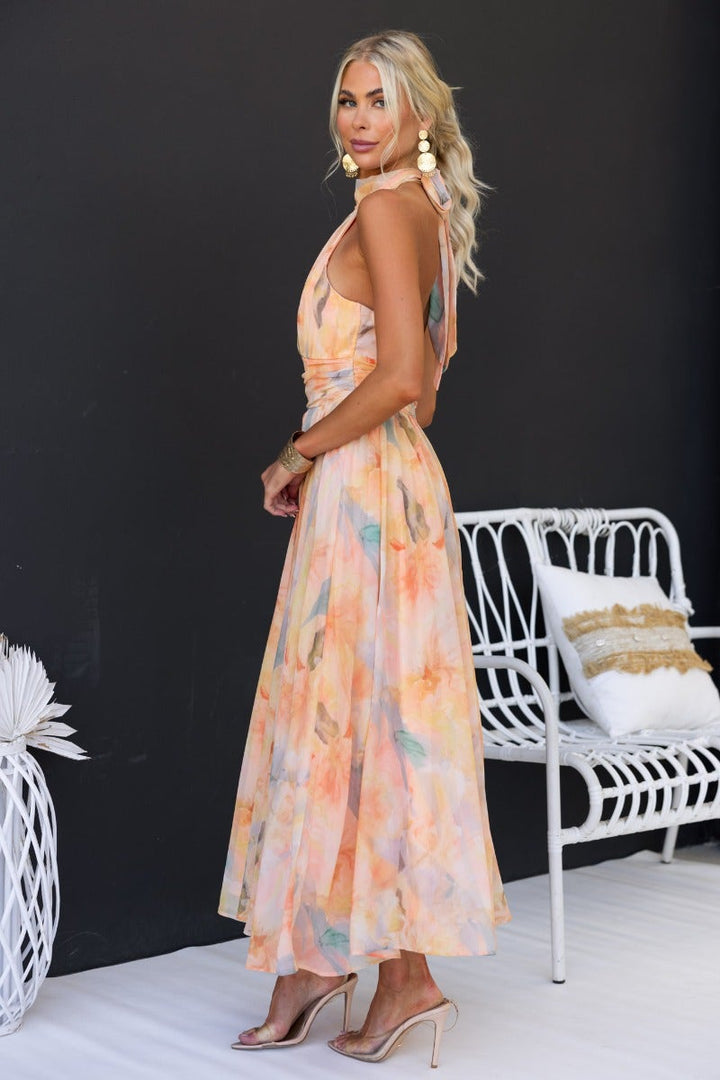 Amparo | Vestido largo sin mangas con cuello alto anudado
