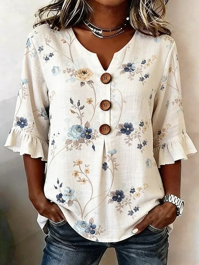 Palmenia | Blusa a rayas con estampado floral