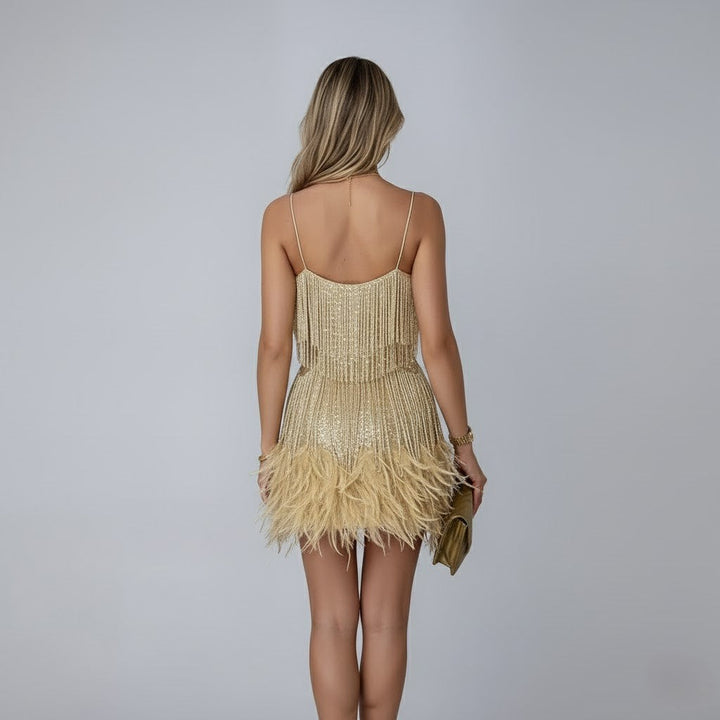 Zenaida | Vestido de fiesta con flecos y ruedo de plumas