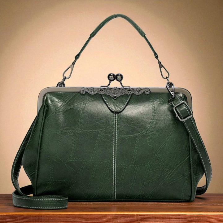 Delfina | Cartera vintage con cierre de beso