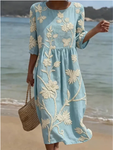 Nuria | Vestido midi floral cuello redondo