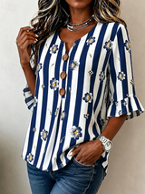 Palmenia | Blusa a rayas con estampado floral