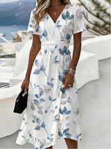 Noelia | Vestido midi vaporoso con estampado de hojas