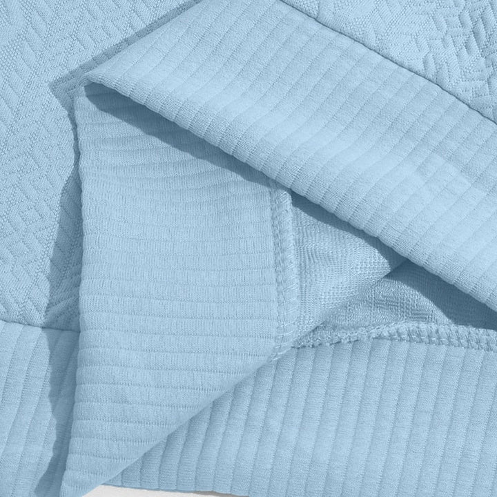 Ezio | Sweater texturado con cierre corto