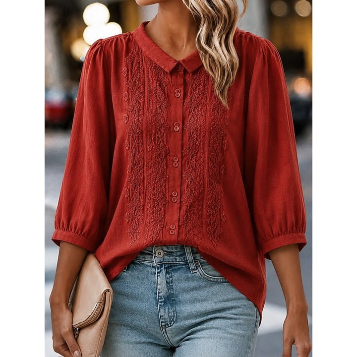 Clara | Blusa con cuello bebé y bordado frontal