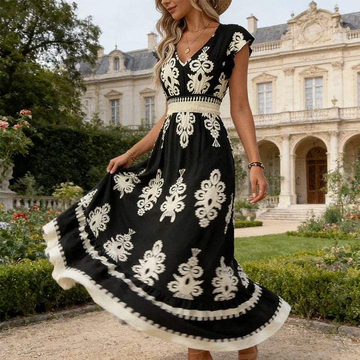 Gemita | Vestido largo con escote en V y estampado ornamental