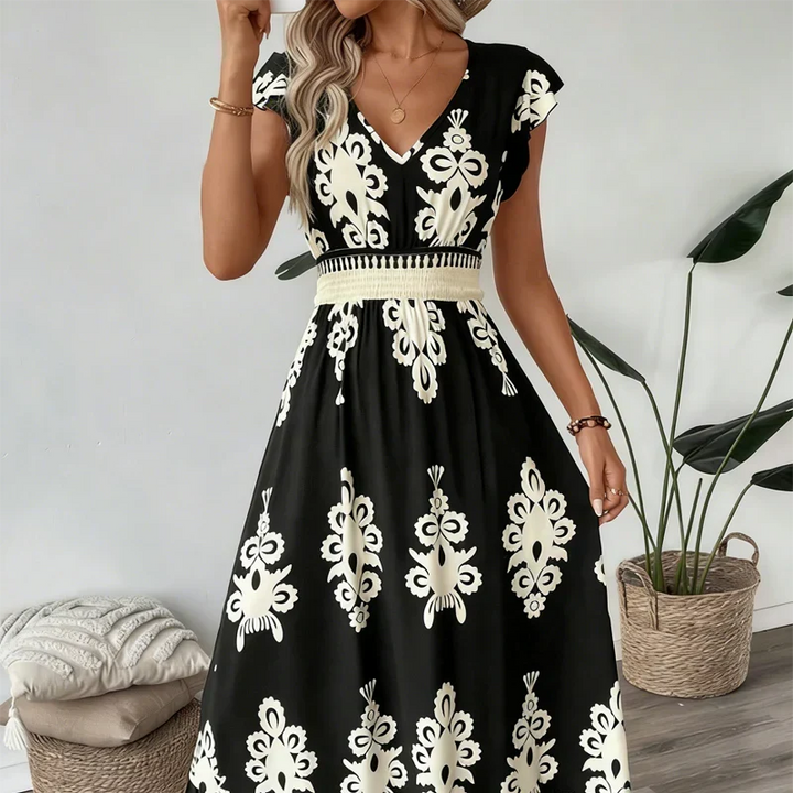 Gemita | Vestido largo con escote en V y estampado ornamental