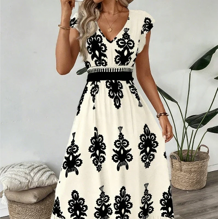 Gemita | Vestido largo con escote en V y estampado ornamental