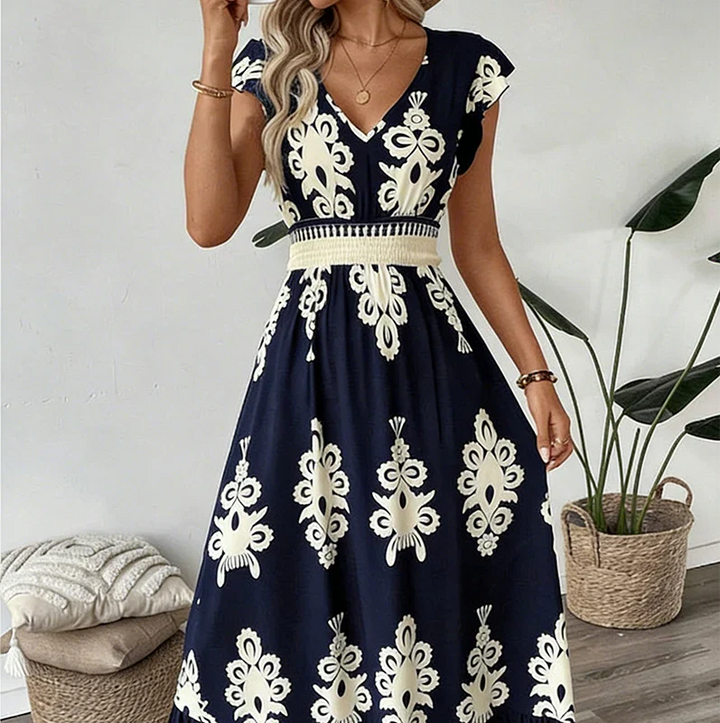 Gemita | Vestido largo con escote en V y estampado ornamental