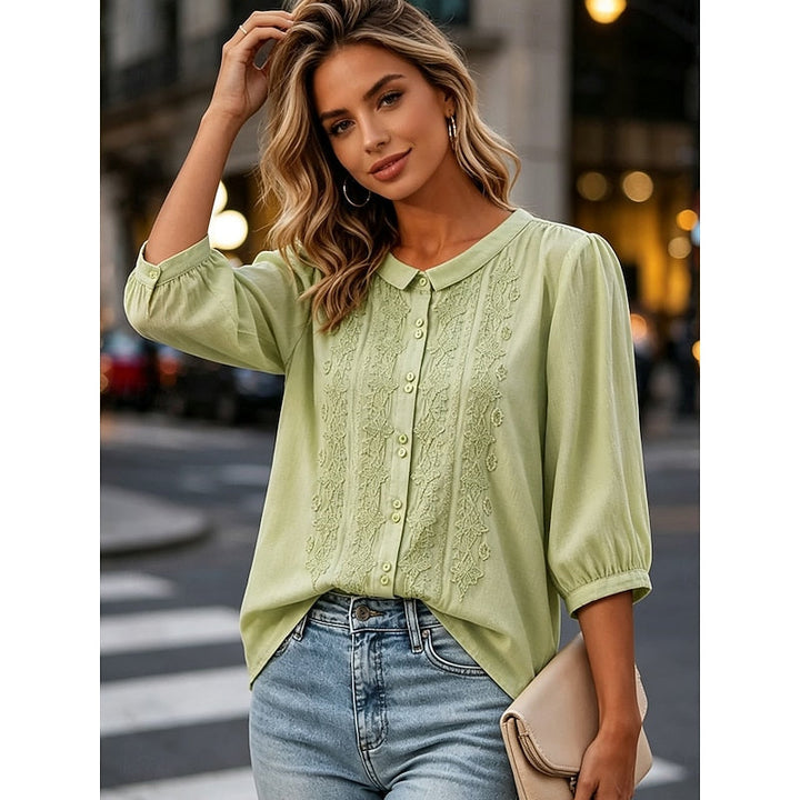 Clara | Blusa con cuello bebé y bordado frontal